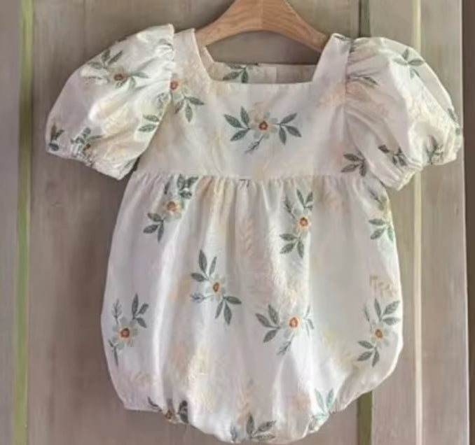 Green embroidered flower