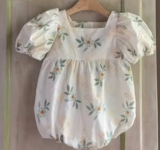 Green embroidered flower